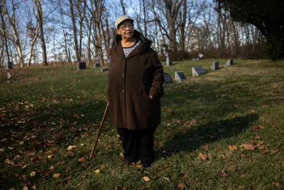 Janis Ivory in the cemetery where her parents are buried in Rendville, OH where she grew up. Janis, her brother Harry and others are working to revitalize the old coal town.